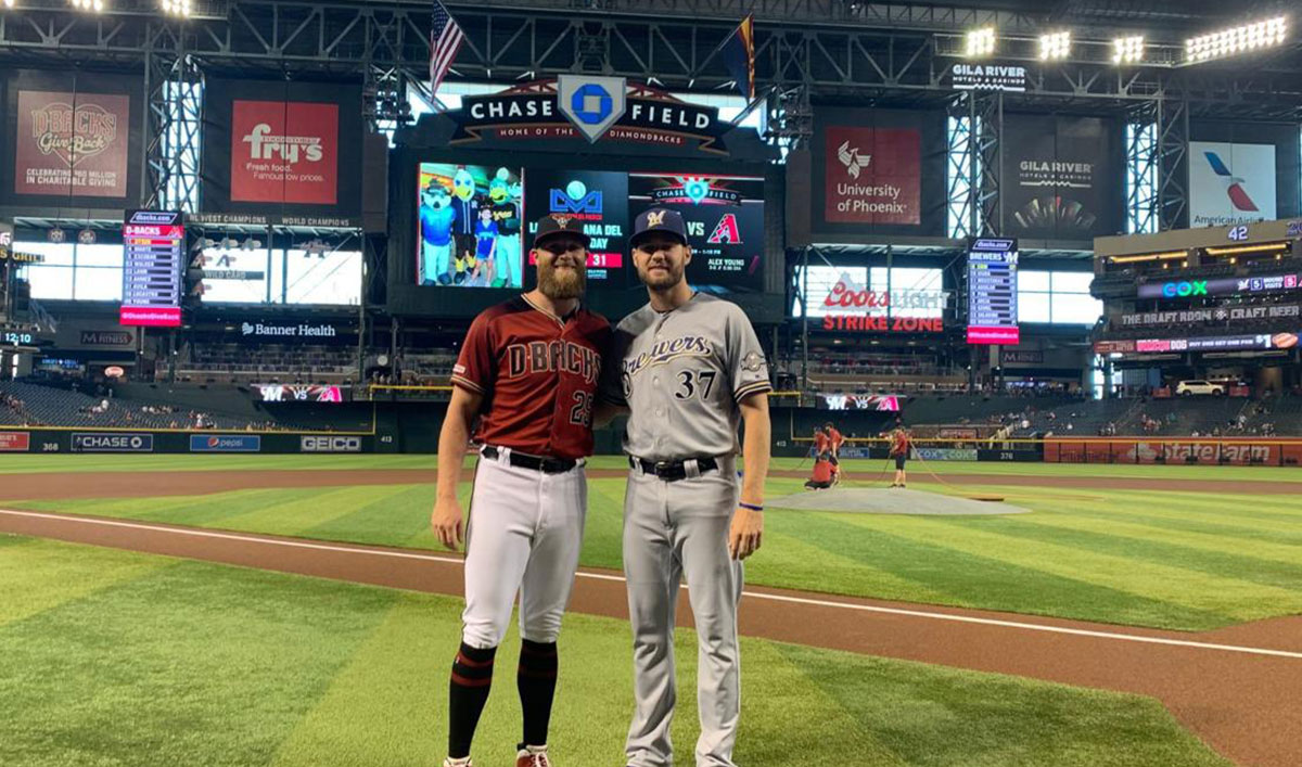 Archie Bradley catching up with Adrian Houser.