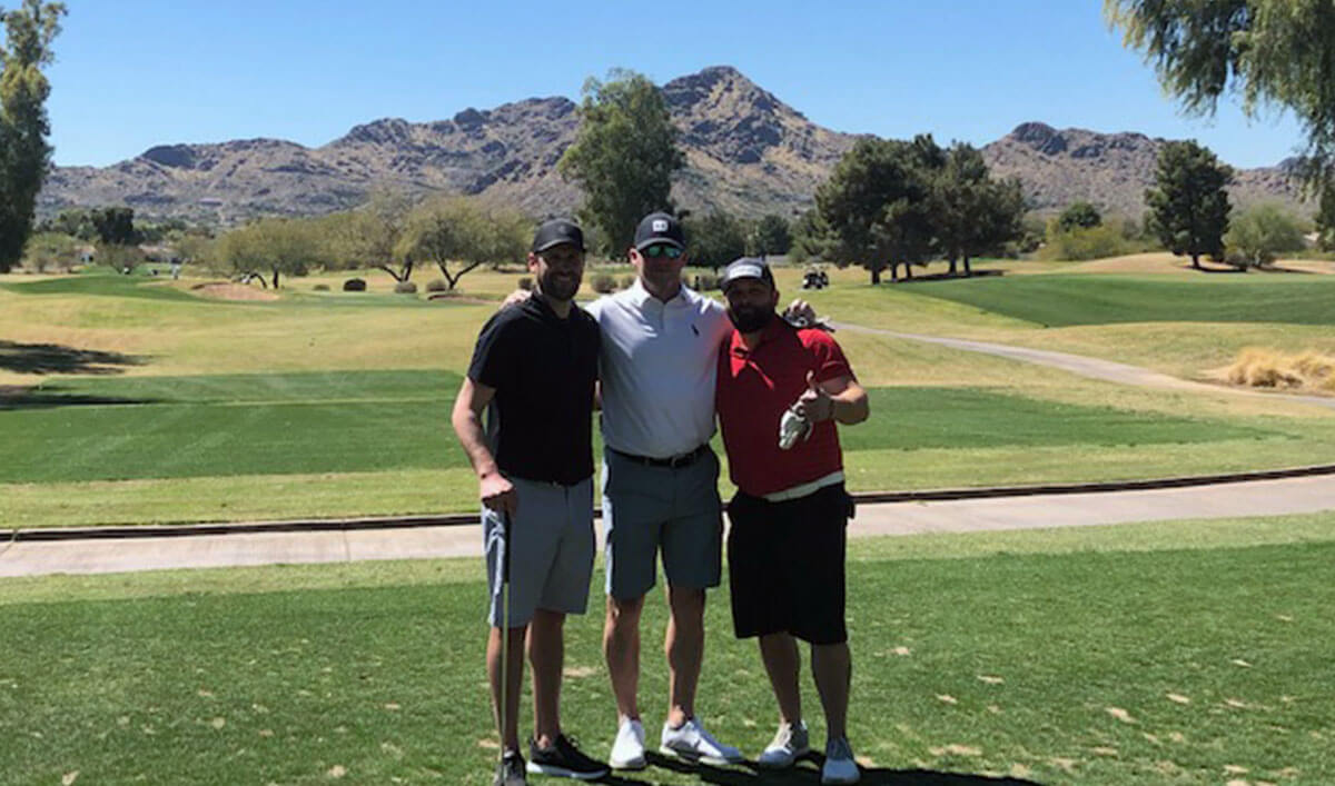 The BBI team playing golf.